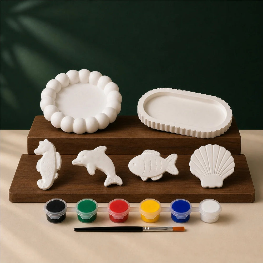 Bubble Oval Sea Four DIY plaster of paris painting kit for kids — unpainted pieces with six paint colours and a brush