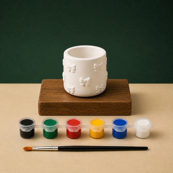 Bow-Detail Organizer Cup DIY plaster of paris painting kit for kids — unpainted pieces with six paint colours and a brush