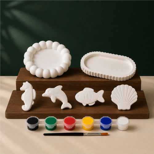 Bubble Oval Sea Four DIY plaster of paris painting kit for kids — unpainted pieces with six paint colours and a brush