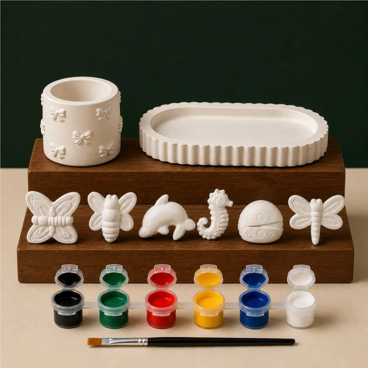 Oval Bow Nature Six DIY plaster of paris painting kit for kids — unpainted pieces with six paint colours and a brush