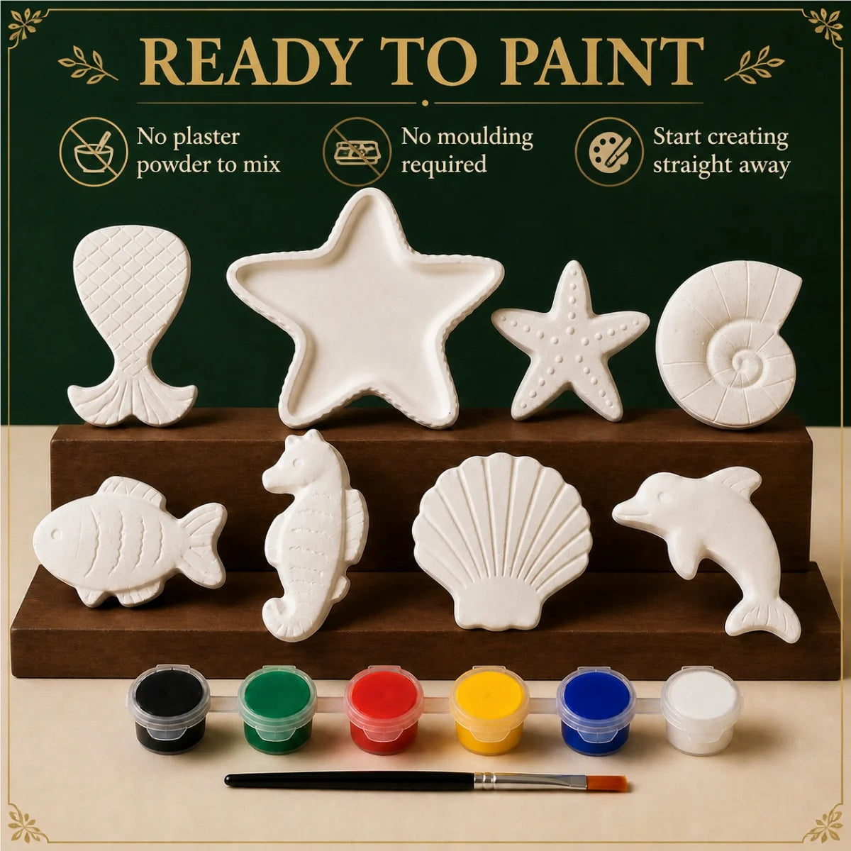 The pieces being painted at a table